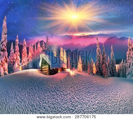 Climbing To Tourist Wild Alpine Mountain To An Abandoned Cabin-in Order To Illuminate The Snow-cover