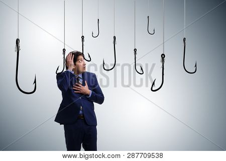 Businessman being tempted to bite the bait