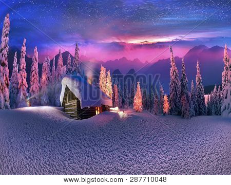 Climbing To Tourist Wild Alpine Mountain To An Abandoned Cabin-in Order To Illuminate The Snow-cover