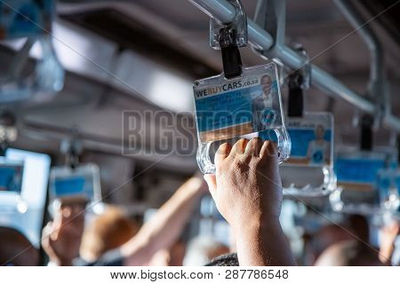 Johannesburg, South Africa, 28th February - 2019: Passengers Hands On Support Handles On Airport Tra