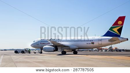 Johannesburg, South Africa, 28th February - 2019: Plane Waiting On Tarmac At International Airport