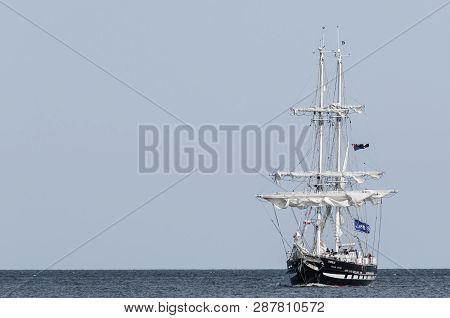 Swinoujscie, West Pomeranian / Poland - 2017: Sailing Ship Royalist Flows On The Maritime Waterway