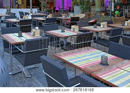 Empty Tables In Front Of Restaurant In London