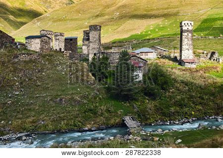 Ladscape With Stone Svan Towers, River, And Meadow