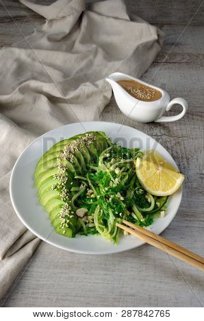 Chukka Salad, Cucumber Noodles With Avocado And Peanut Brown Sauce In Sauceboat