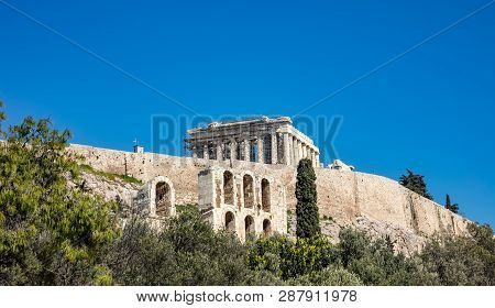 Acropolis Of Athens Greece Rock And Parthenon On Blue Sky Background, Sunny Day.