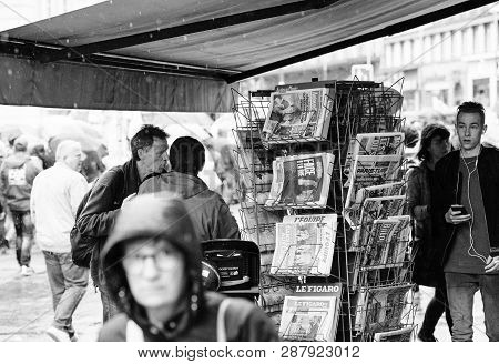 Strasbourg, France - Sep 12, 2017: Newspaper With Emmanuel Macron As Crowd Marching In Background Du