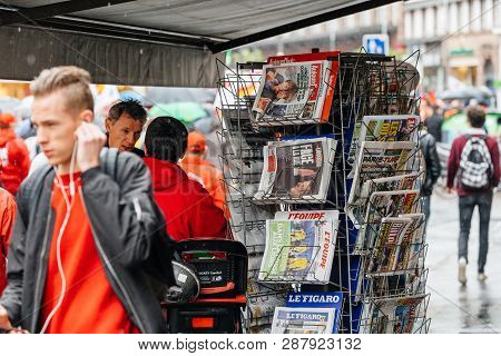 Strasbourg, France - Sep 12, 2017: Newspaper With Emmanuel Macron As Crowd Marching In Background Du