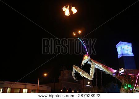 2/25/2019 Las Vegas, Nevada: Fire Breathing Music Playing Dancing Praying Mantis Sculpture on Freemont Street in Las Vegas Nevada. 