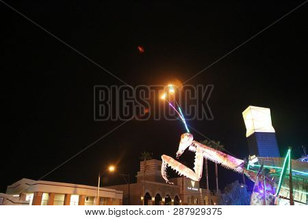 2/25/2019 Las Vegas, Nevada: Fire Breathing Music Playing Dancing Praying Mantis Sculpture on Freemont Street in Las Vegas Nevada. 
