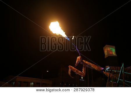 2/25/2019 Las Vegas, Nevada: Fire Breathing Music Playing Dancing Praying Mantis Sculpture on Freemont Street in Las Vegas Nevada. 
