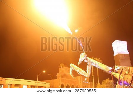 2/25/2019 Las Vegas, Nevada: Fire Breathing Music Playing Dancing Praying Mantis Sculpture on Freemont Street in Las Vegas Nevada. 
