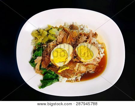 Thai Food Style, Top View Of Stewed Pork Leg And Boiled Egg On Rice Isolated On White Background, Th