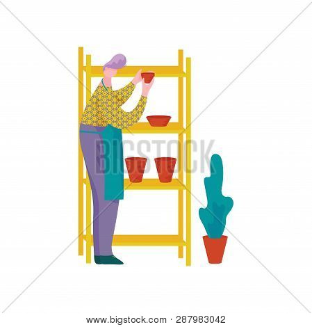 Male Ceramists Working At Pottery Workshop, Man Placing Crockery On Shelves, Craft Hobby Or Professi