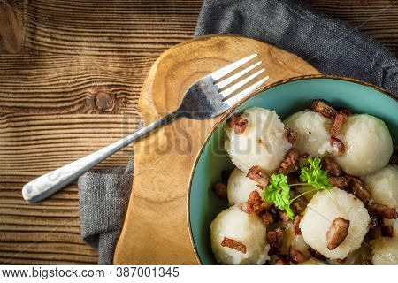 Meat Stuffed Potato Dumplings With Fried Onion And Greaves.