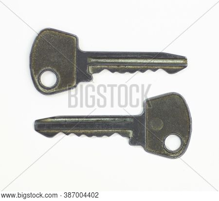 Old Key Isolated. Keys On Table. Ancient Keys, Used For Long Time. Vintage Key On White Background.