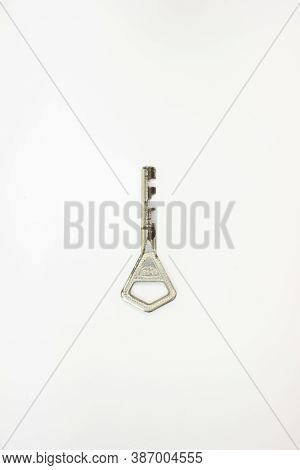 Old Key Isolated. Keys On Table. Ancient Keys, Used For Long Time. Vintage Key On White Background.