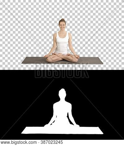 Relaxed Woman In Yoga Position Putting Hands Together And Medita