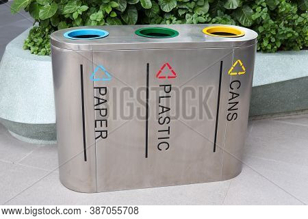 Stainless Steel Trash Placed In Public Areas Color Separation In Littering (concept Of Waste Separat