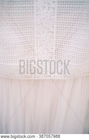 Close-up Of The Fabric Of A White Wedding Dress.