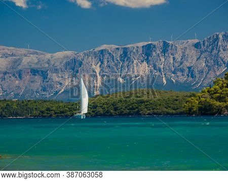 Saiing ship in the bay of Nidri in Greece