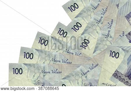 100 Philippine Piso Bills Lies In Different Order Isolated On White. Local Banking Or Money Making C