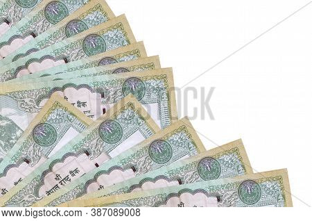 100 Nepalese Rupees Bills Lies Isolated On White Background With Copy Space Stacked In Fan Close Up