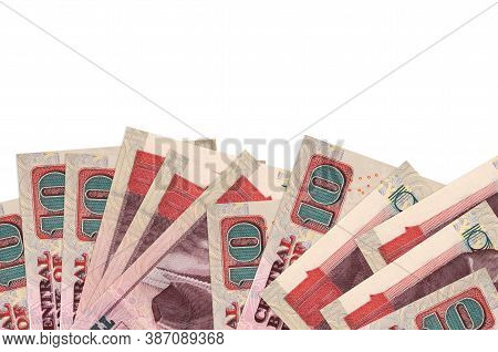 10 Egyptian Pounds Bills Lies On Bottom Side Of Screen Isolated On White Background With Copy Space.
