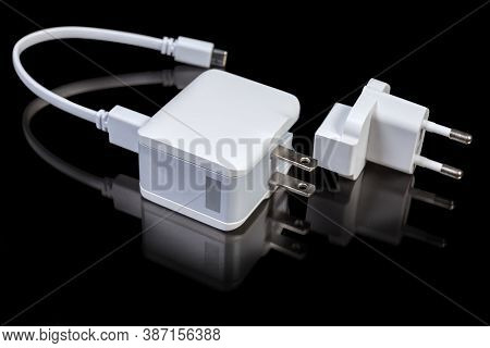 Ac Adapter For Mobile Equipment Batteries Charging With Combined North American And European Ac Plug