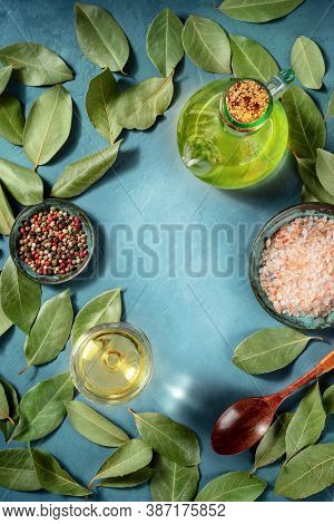 Cooking Background With Olive Oil, Salt, Pepper, Bay Leaves And Wine, With A Place For Text, Top Sho