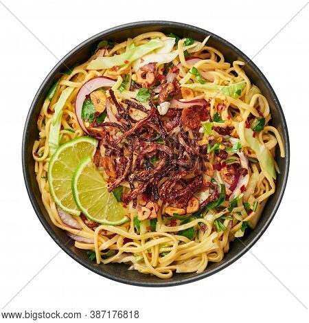 Burmese Atho In Black Bowl Isolated On White. Atho Is Myanmar Indian Cuisine Dish Popular In Chennai