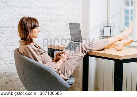 Nice Beautiful Lady With Brunette Hair Work At Notebook Sit At Chair At Home, Check On Oline Shops F
