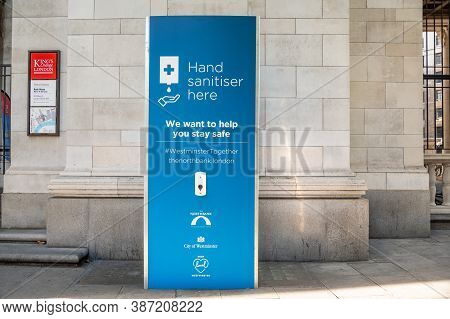 London - September 12, 2020: Free Public Hand Sanitiser Station Outside King's College London Bush H