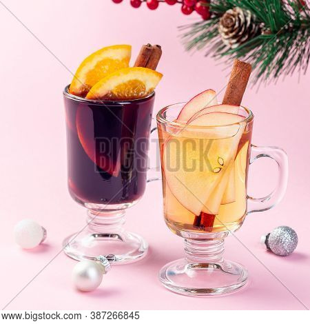 Red And White Glogg Or Mulled Wine With Orange And Apple Slices And Cinnamon Stick, Christmas Decora