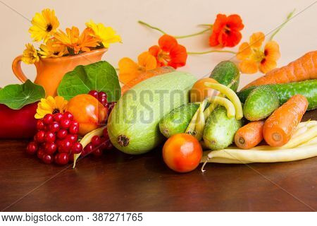 Autumn Colorfull  сomposition With Raw Vegetables Cucumbers, Zucchini, Tomatoes, Yellow Green Beans,