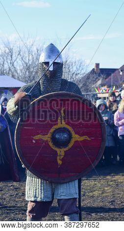 Viking In Helmet, Chain Mail, With Sword And Shield. Village Argamac Palna. Lipetsk Region. Russia. 