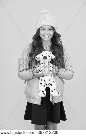 Afterschool Special. Happy Girl Go To Afterschool With Toy Dog. Little Schoolchild Yellow Background