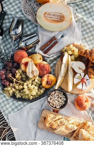 Picknick With Food And Fruits Outdoors In Nature