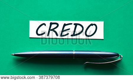 Credo - Word On A Green Background With A Black Handle. Info Concept