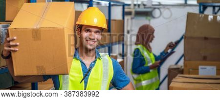 Banner Of Idian Worker Man Holding Cardboard Box And Walking With Muslim Worker Woman Scanning Bar C