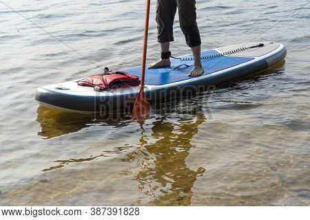 Standup Paddleboarding Are On The River Moscow, Strogino.