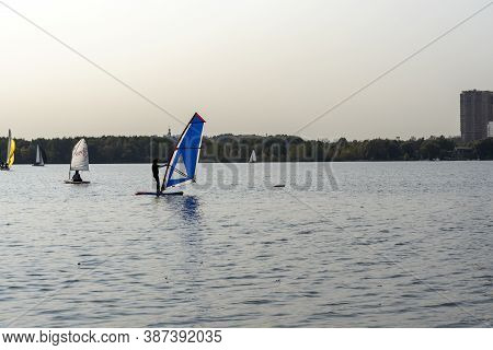 Standup Paddleboarding Are On The River Moscow, Strogino.