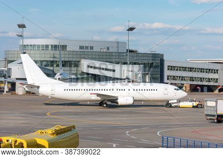 Airport Terminal Airplane Jet And Towing Truck