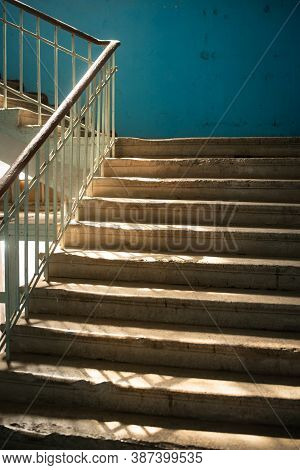 Brutalism In Architecture. Raw Concrete Steps Of Brutal Style Staircase. Concrete Prefab Stair. Blue