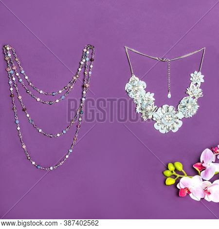 Elegant Gold Necklace With Diamonds On Purple Background