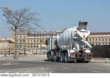 Concrete mixer truck at a city construction site