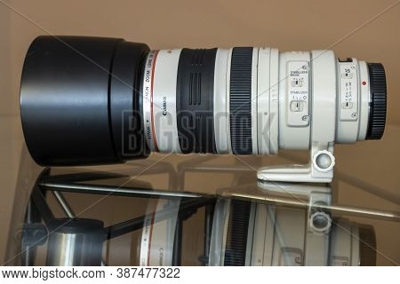 Cologne, Germany - September 28th 2020: A German Photographer Taking Detailed Pictures Of His Canon 
