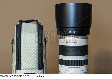 Cologne, Germany - September 28th 2020: A German Photographer Taking Detailed Pictures Of His Canon 