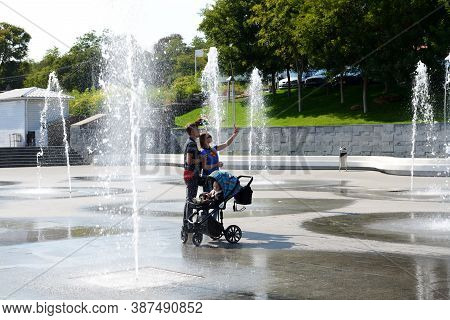 Odesa, Ukraine - September 25: The Young Family Making Selfy On Fountain Area On Lanzheron Beach On 