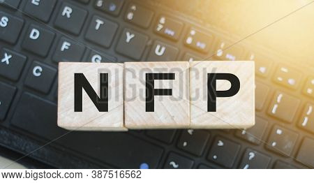 Nfp - Acronym From Wooden Blocks With Letters, Abbreviation Nfp Nonfarm Payrolls Key Economic Indica